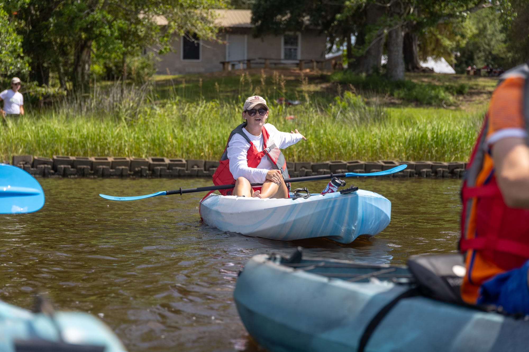 participants exploring a living shoreline