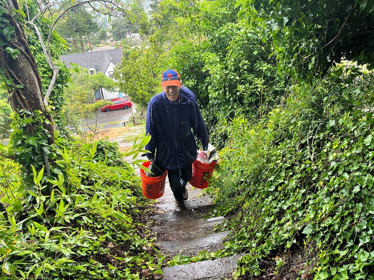 Volunteers brave the rain for Berkeley wildfire cleanup