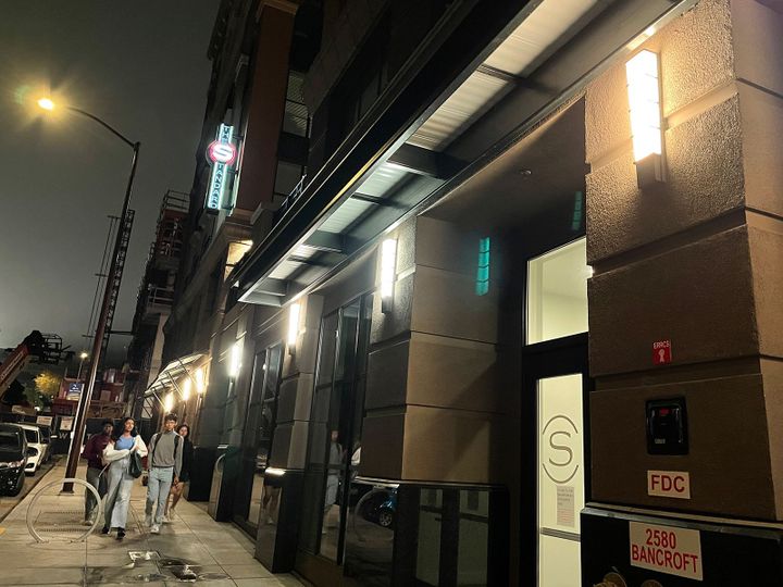 Students walk past The Standard student housing complex on Bancroft Way in Berkeley.