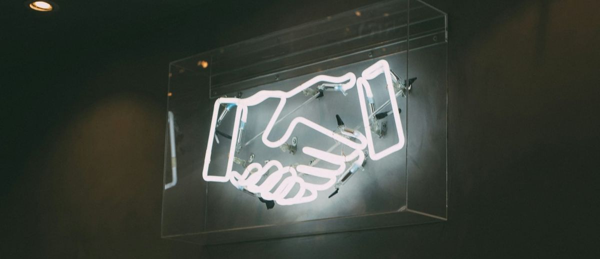 A fluorescent light handshake