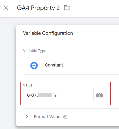 Paste your analytics tracking ID for the second GA property