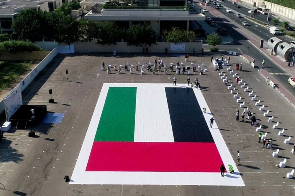 Guinness World Records title for 498.33 m² UAE flag made with mosaic