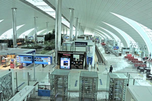 Is travel insurance mandatory for 5-year tourist visa holders every time they fly to UAE?