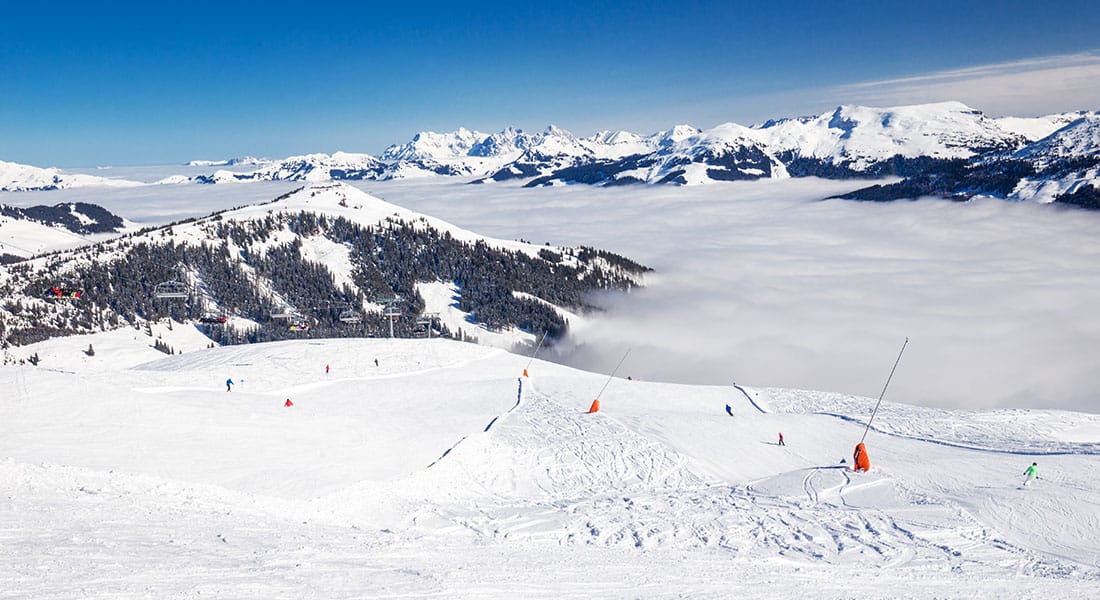 Ski run above the clouds in Kitzbuhel