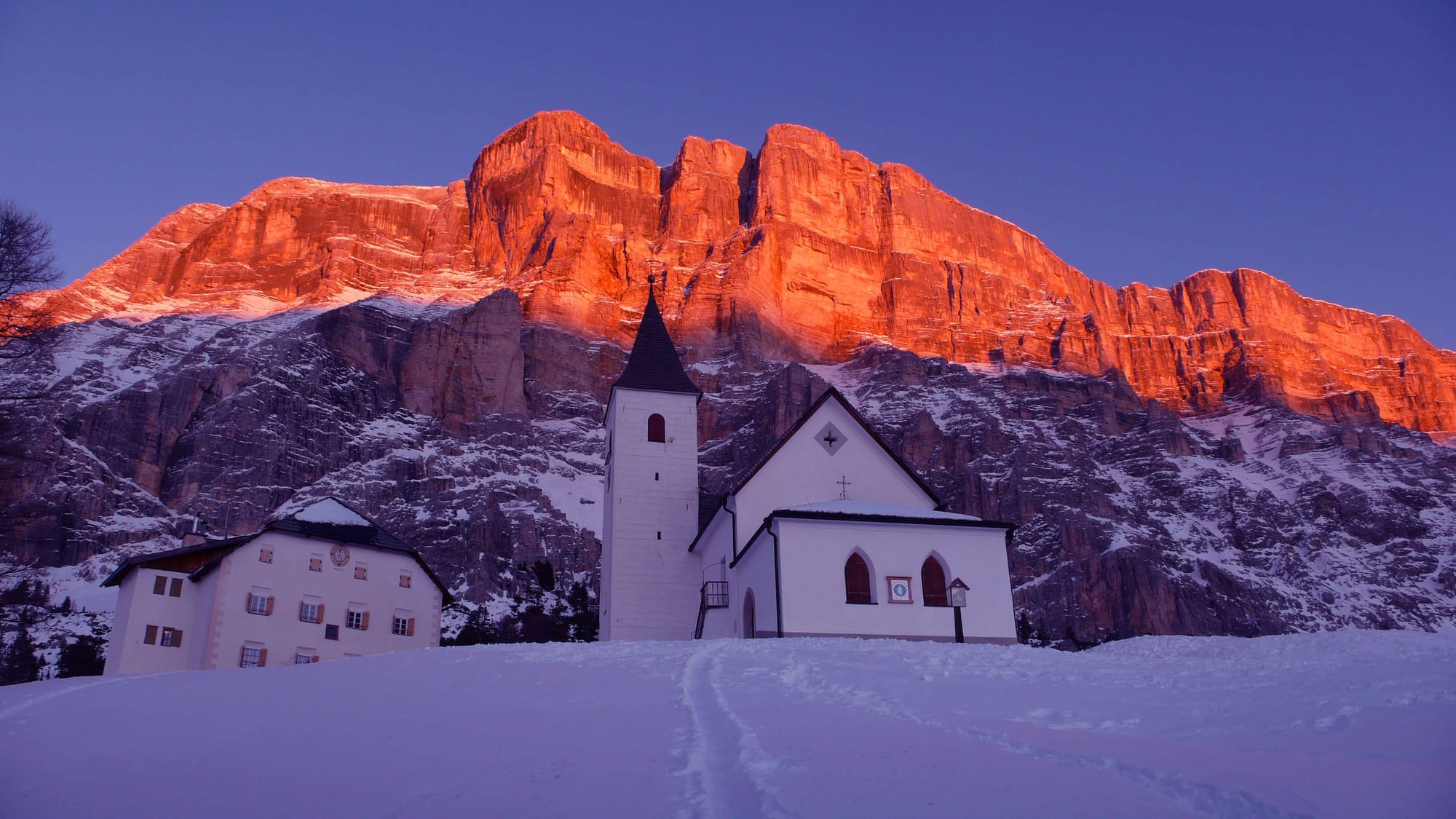 Church in Alta Badia with stunning rocky backdrop