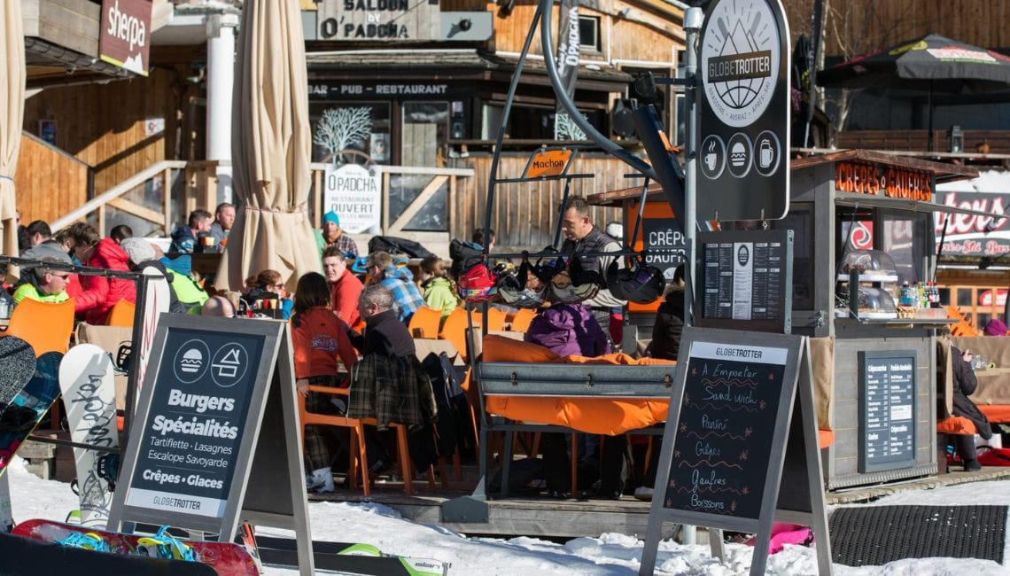 Crowds enjoy the food and drink on Globe Trotter Cafe Bar's outdoor terrace