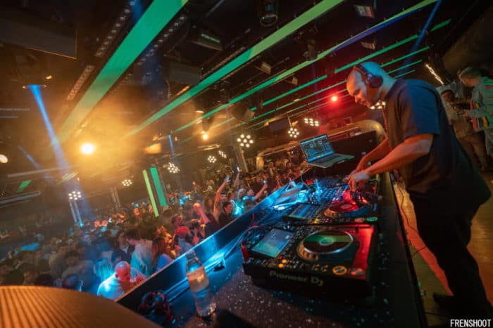 Crowds enjoying a DJ inside Strike