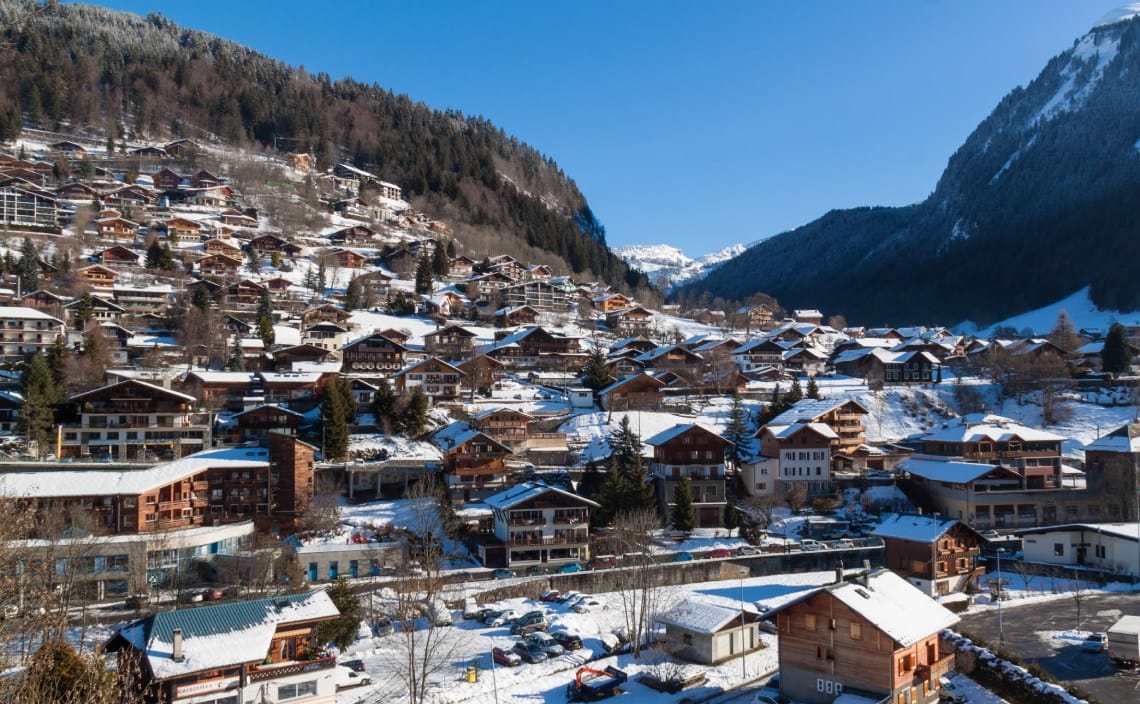 Morzine town with snow on rooftops