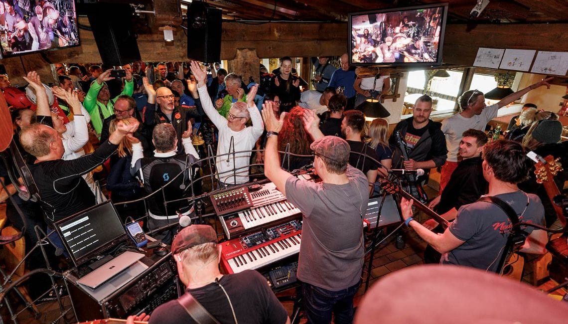 Nederhutte's live music scene in action with a crowd enjoying a band