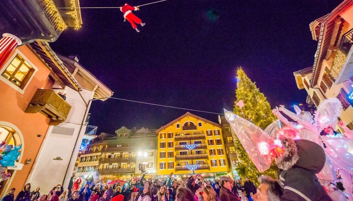 Santa arrives in Les Arcs on a rope from the rooftops