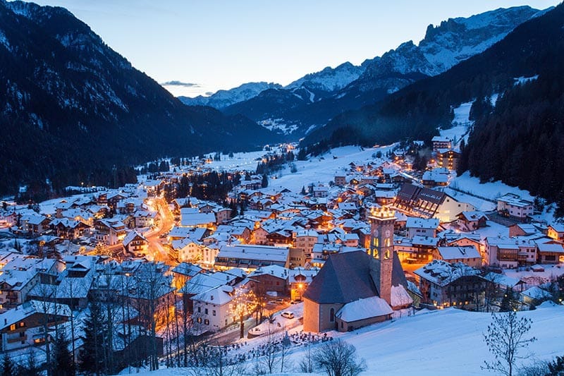 Aerial view of Val Di Fassa ski resort with lights on