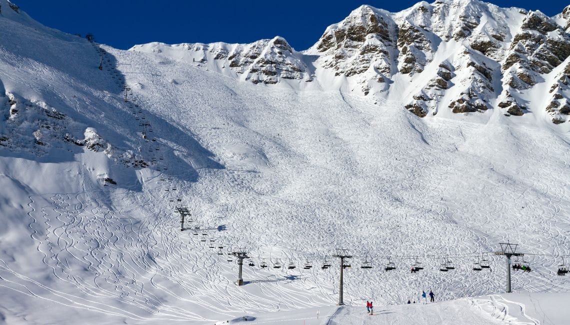 The Swiss Wall ski slope with lots of moguls and a chairlift going up it
