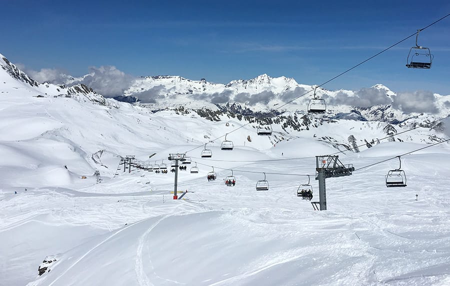 Chairlift going over huge area of skiing 