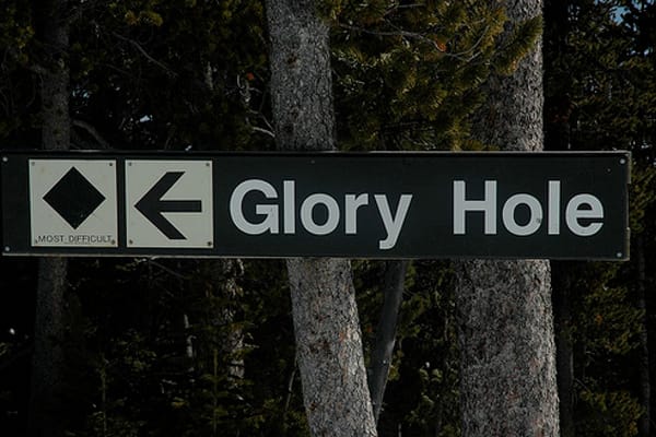 Sign for Glory Hole ski run in Alta