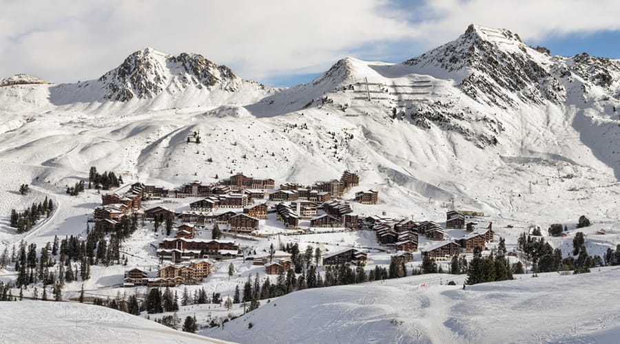 La Plagne village with mountain scenery surrounding it