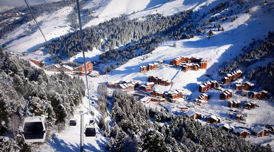 View of slopes in Meribel from a gondola