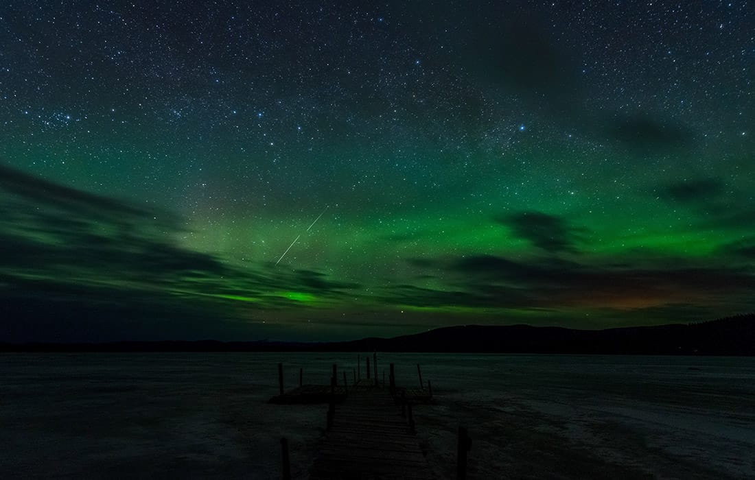 Northern Lights over a frozen lake in Alaska