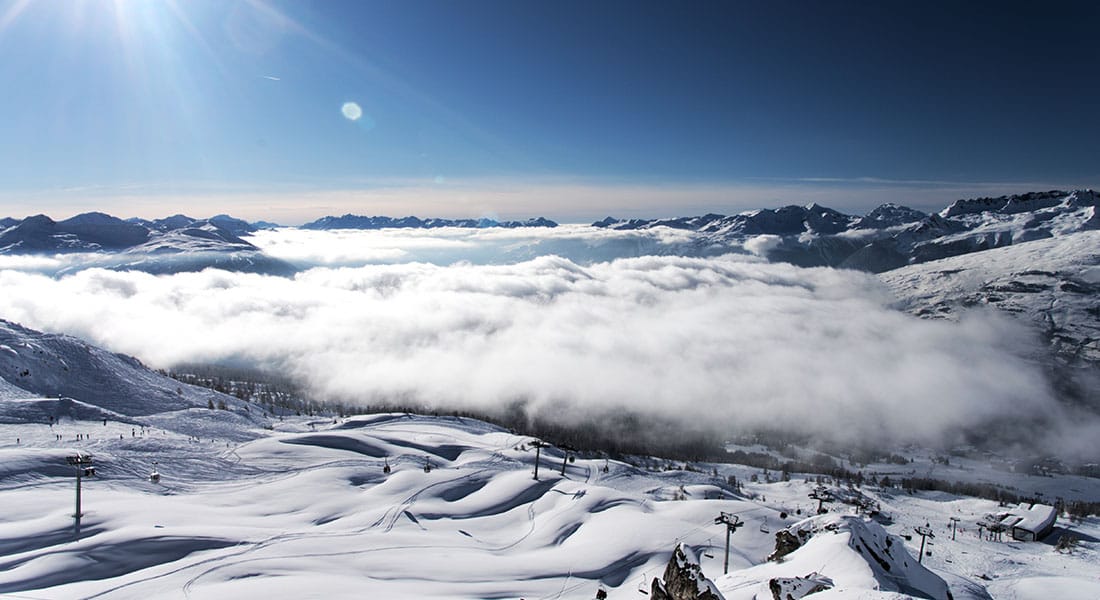 View above the cloudline or snowy slopes