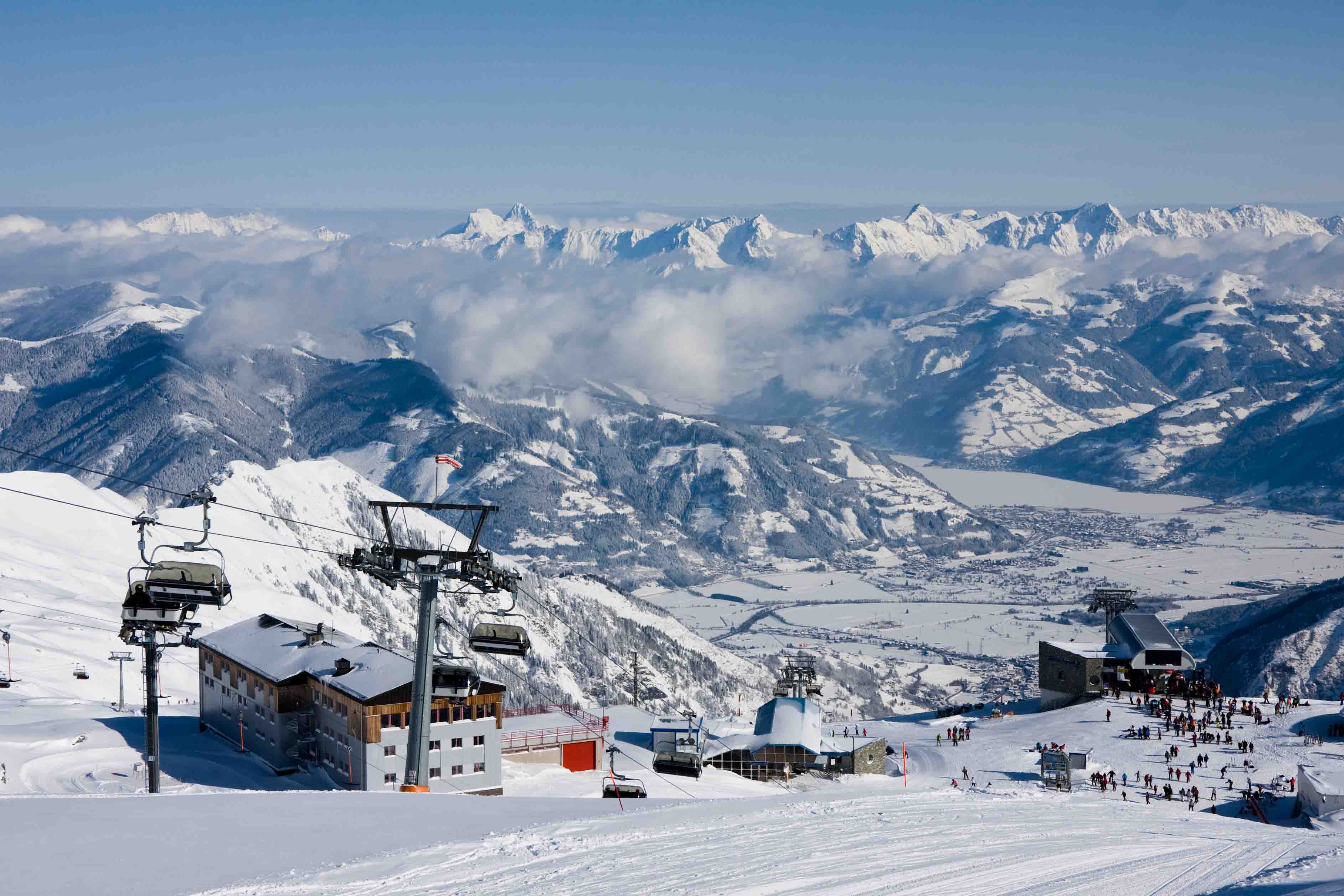 View of valley from Kaprun with chairlifts going up and dramatic backdrop
