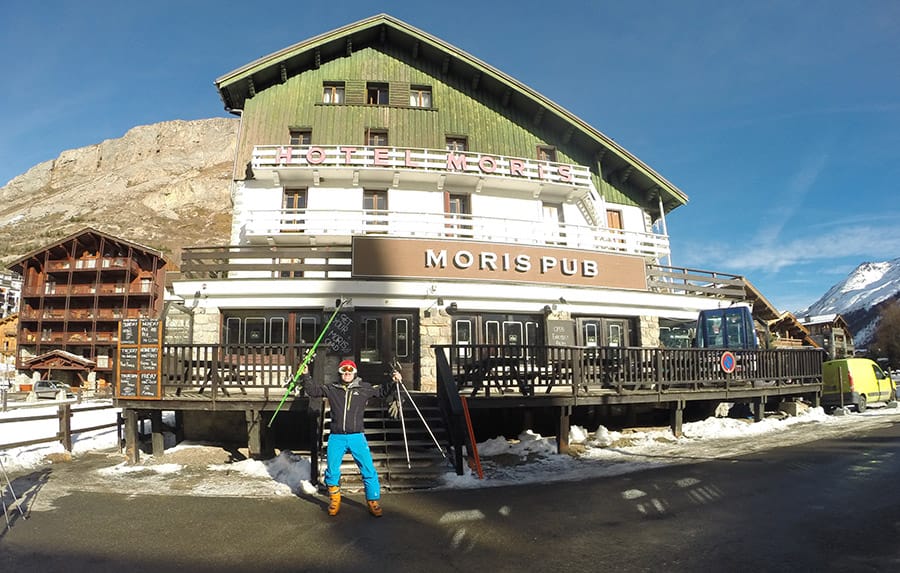 Moris Pub with man outside being happy