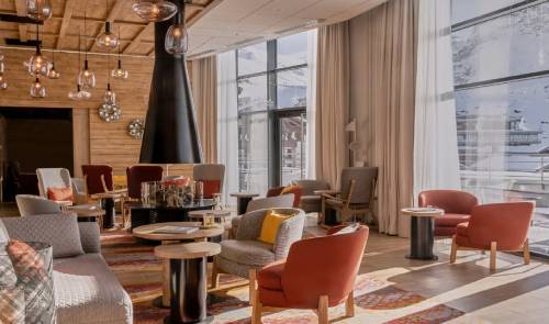 Relaxation area at Club Med Tignes with comfortable chairs and sofas