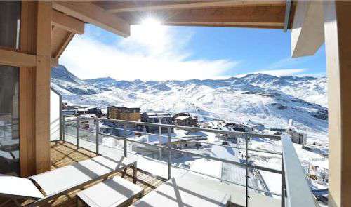 Balcony at Club Med Val Thorens with deckchairs and sun shining