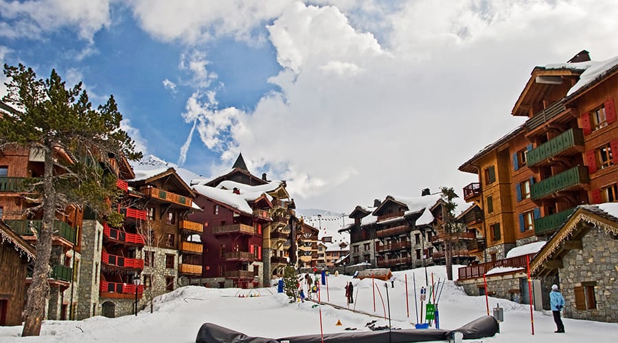 Village centre Les Arcs 1950 with snow and children enjoying themselves