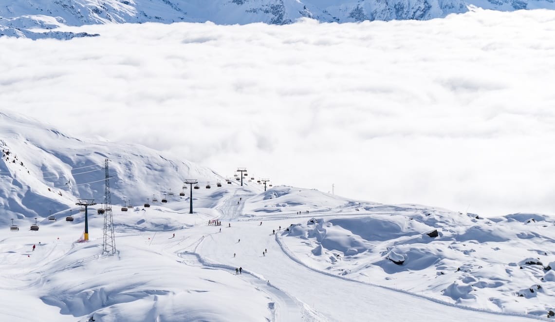 A ski slope in Gressoney, Monterosa, with thick cloud in the valley