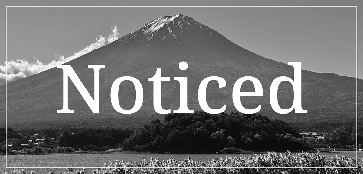 Noticed logo with Mt Fuji in the background