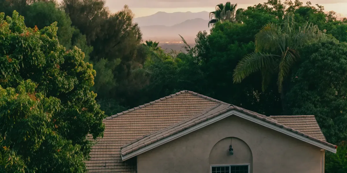 Fire-resistant roof protecting a home in a mountainous, wooded area.