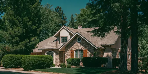 A stone house with the best siding for protection in a high fire risk area.