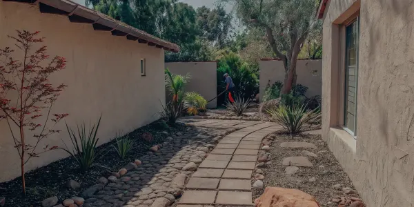 A home with a clean, defensible space created by following fire wise landscaping maintenance tips.