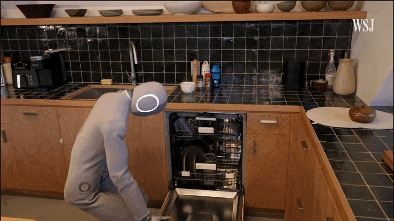 Robot does a cool dance and sorta closes a dishwasher door