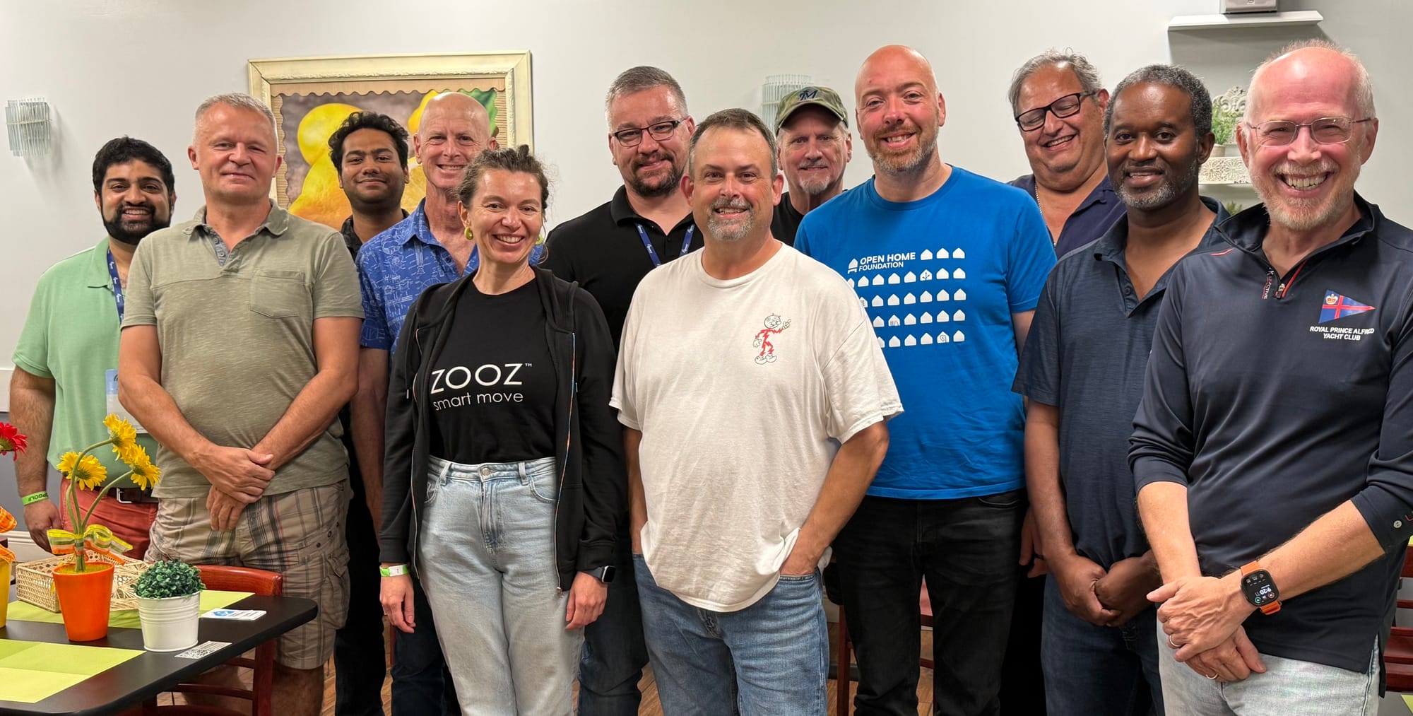A group of 12 people smiling at the camera at the Home Assistant meetup in Boca Raton, Florida.