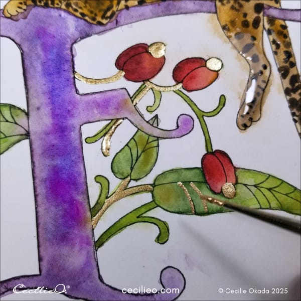 Painting with watercolor gold to illuminate the illustrated letter.
