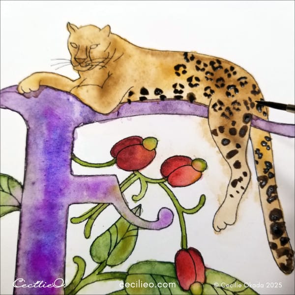 Painting the dots on the body of the leopard.