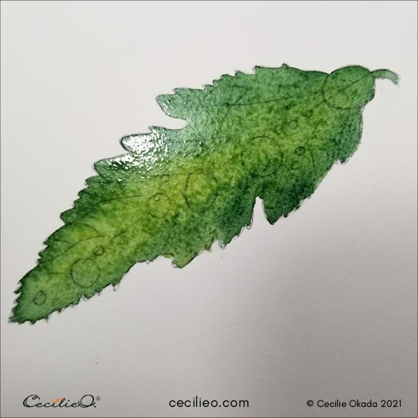 First watercolor layer with green hues.