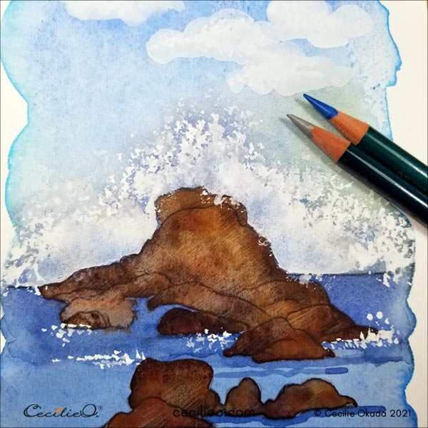Drawing shadows on the waves with colored pencils.