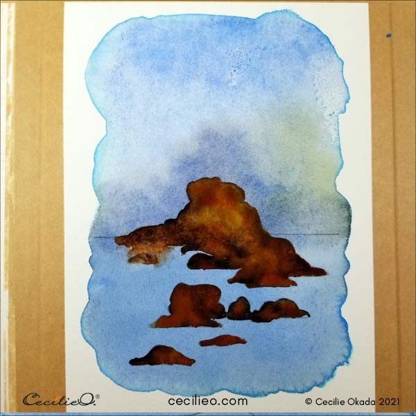 Painting all the rocks with a variety of brown watercolors.