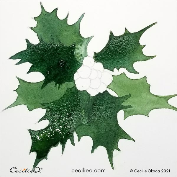 Painting a second layer of green to make it darker.