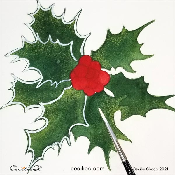 Painting the frosty rim of the leaves with white gouache.