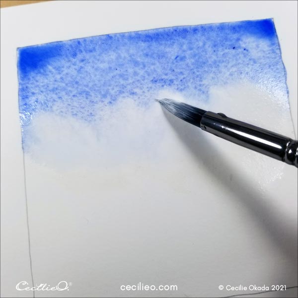 Painting a wall of white with gouache to stop bleeding between the blue and yellow watercolors.