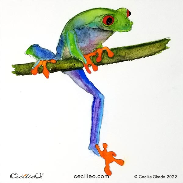 Painting hands, feet and eyes with orange and red.