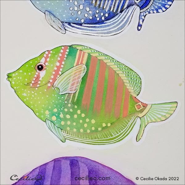 Adding details to the green fish.
