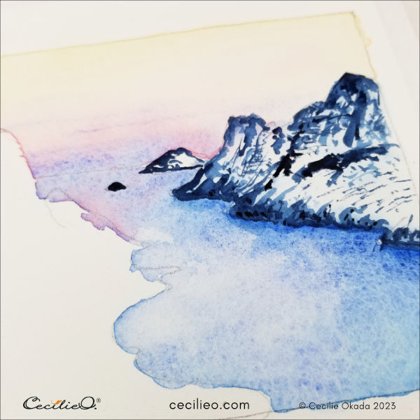 Paint the creases in the mountains with a dark blue watercolor. 