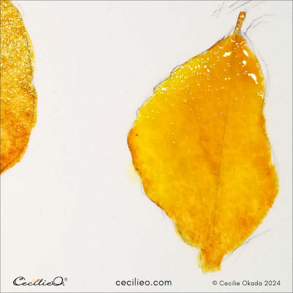 Another leaf with watercolors that flow into each other.