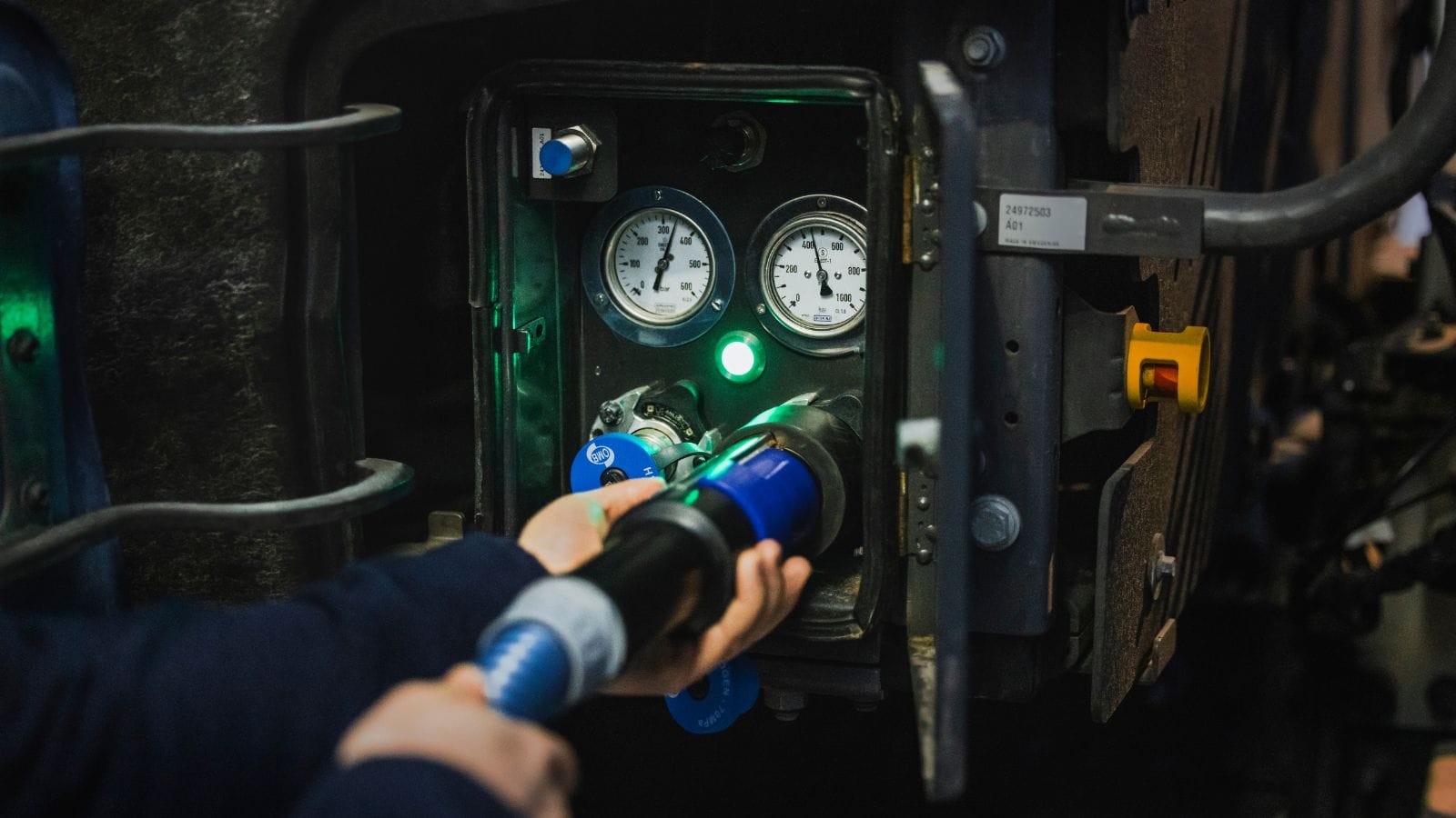 Volvo's hydrogen combustion engine refuelling nozzle and hose.