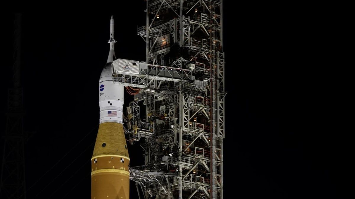 Spotlights illuminate NASA’s Artemis II SLS (Space Launch System) rocket with the Orion spacecraft atop a mobile launcher at Launch Complex 39B at NASA’s Kennedy Space Center in Florida