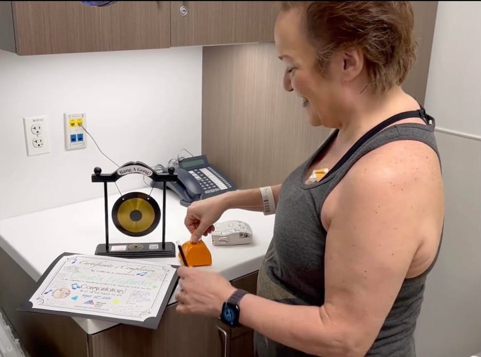 Banging the gong at the Mt. Sinai West infusion center.