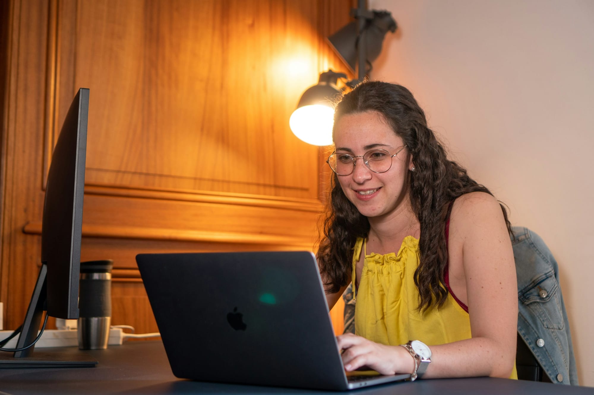 woman smiling - How to Automatically Move Emails to a Folder in Gmail